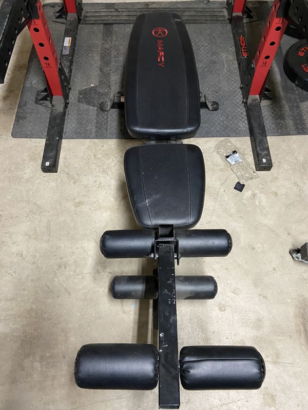 Garage gym ethos rack, chest bench, bench, 3 Olympic bars, and