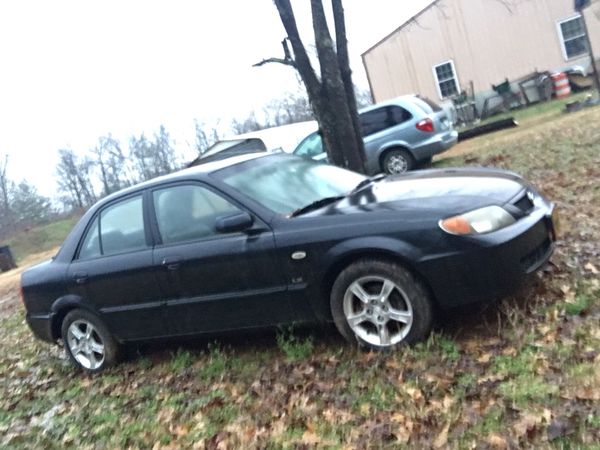 curb weight 2004 mazda protege