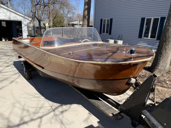 wood runabout with aluminum trailer