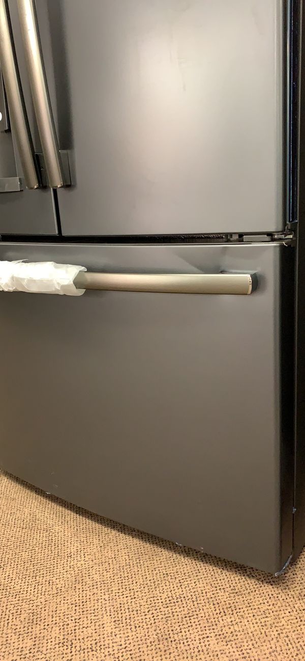 Brand new scratch and dent GE 27.8 cu. ft French door refrigerator with