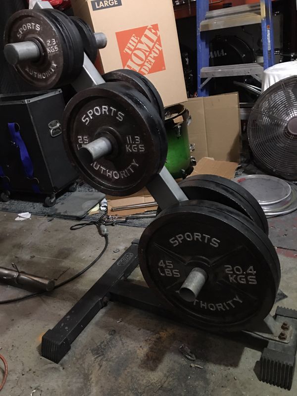 Sports Authority Barbell Olympic weight set with TSA weight rack for