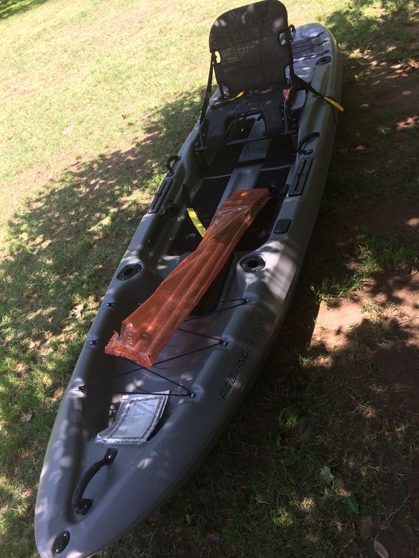 Ozark Trail Pro Angler 12 kayak still in wrappers in
