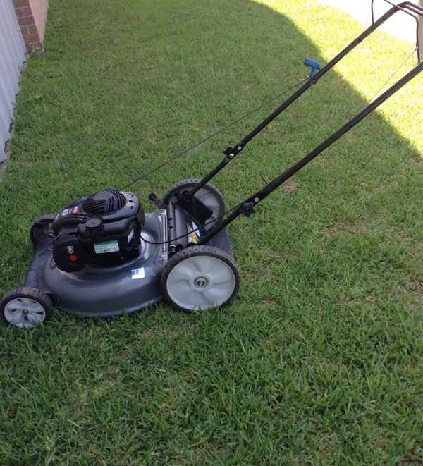 Back push craftsman SILVER 5.00hp lawn mower. In a top mowing condition