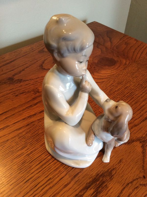 lladro man with dog