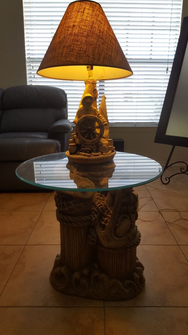 Lazy boy leather counches,nautical custom lamps,coffee table as as well