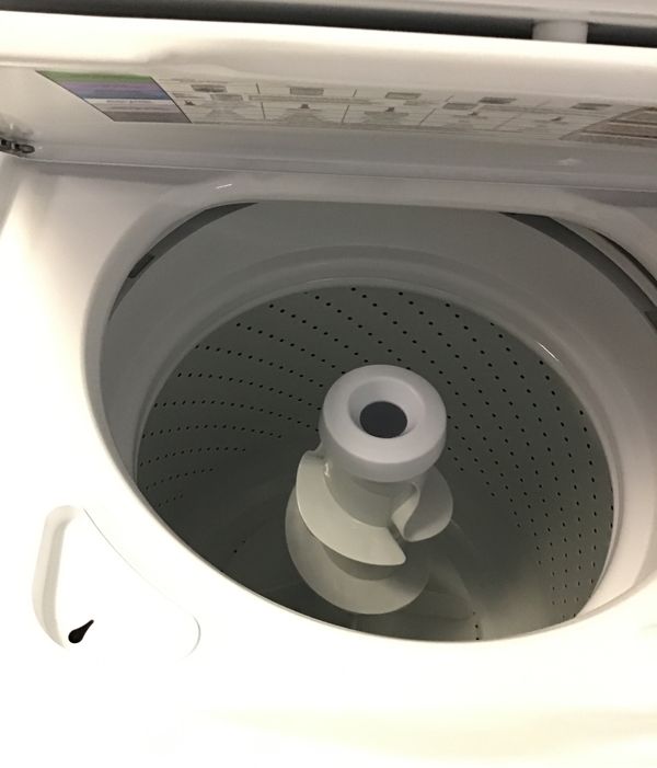 New scratch and dent whirlpool stackable washer and dryer. 1 year