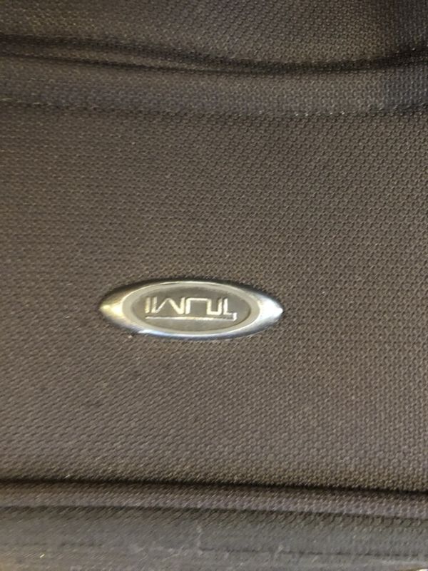 tumi handle