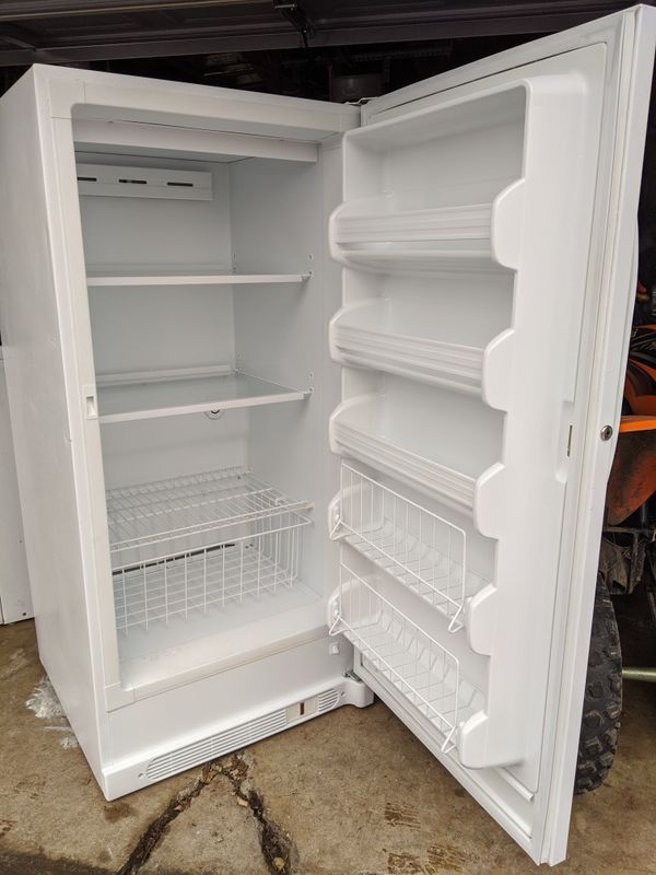 kenmore refrigerator frost in freezer