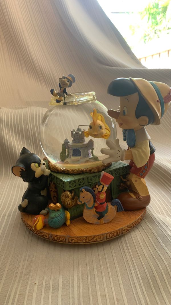 Disney Pinocchio ‘Toyland’ Music Box Snow Globe for Sale in Miami, FL