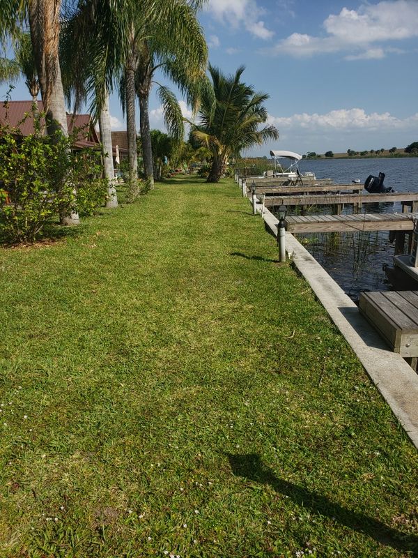 COZY LOG WOOD CABIN ON THE LAKE OKEECHOBEE for Sale in Okeechobee, FL