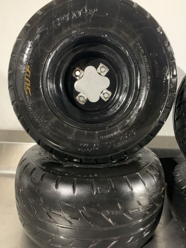 Atv Kawasaki kfx 400 Suzuki ltz 400 rims and tires for Sale in Fort