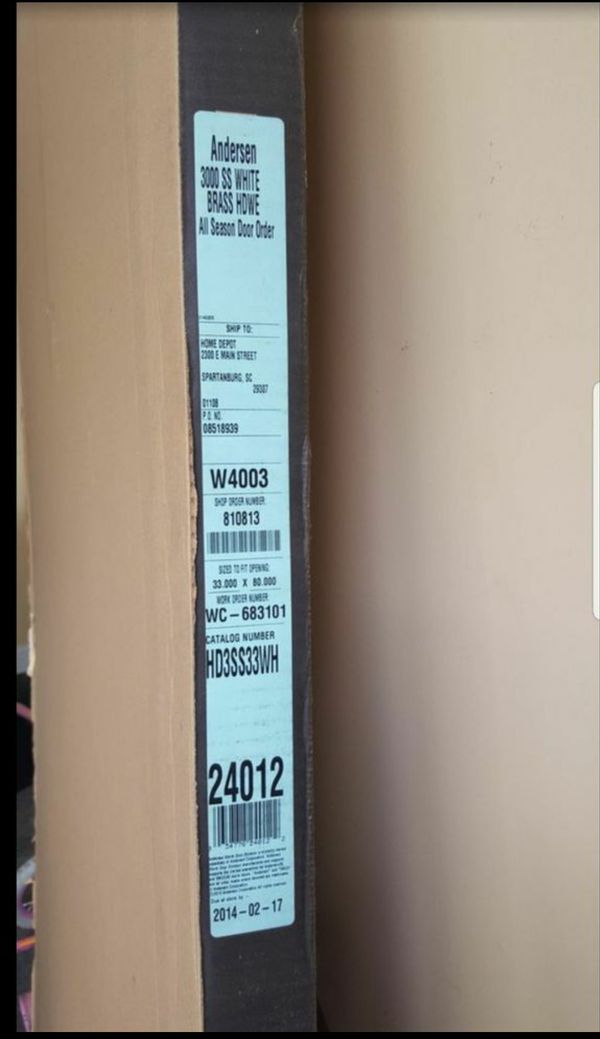 Brand new White Andersen 33 × 80 selfstoring storm door with balanced
