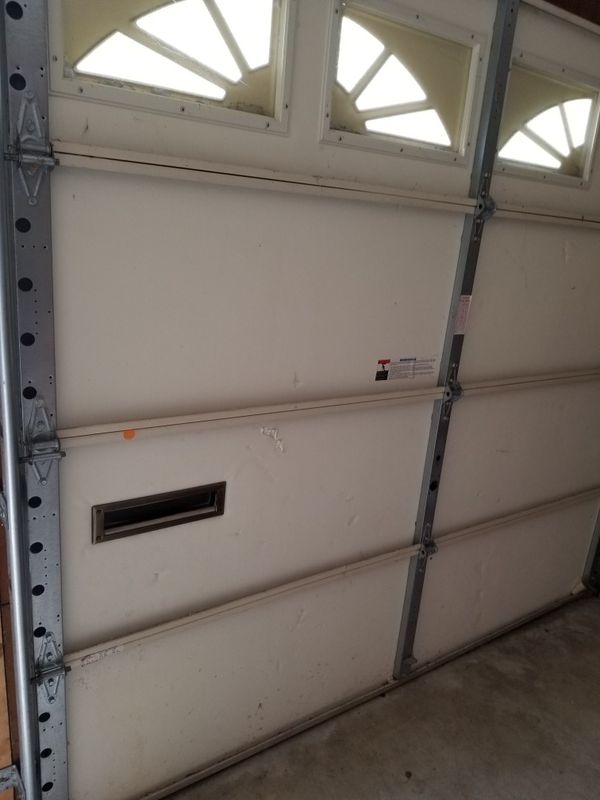 8x7 garage door it has 1/2 vinyl insulation used for Sale in Modesto, CA OfferUp