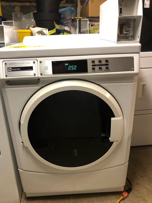 Maytag front loader washer with base.coin operated for Sale in IND