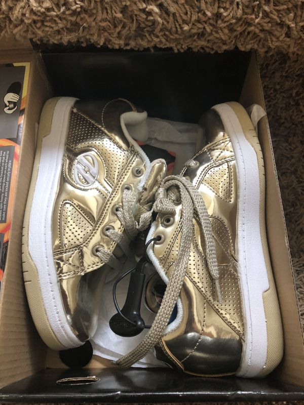 Limited edition gold Heelys for Sale in Puyallup, WA - OfferUp