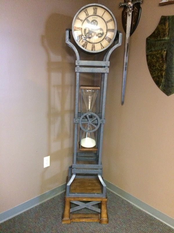 Howard Miller hourglass floor clock for Sale in Janesville, WI OfferUp