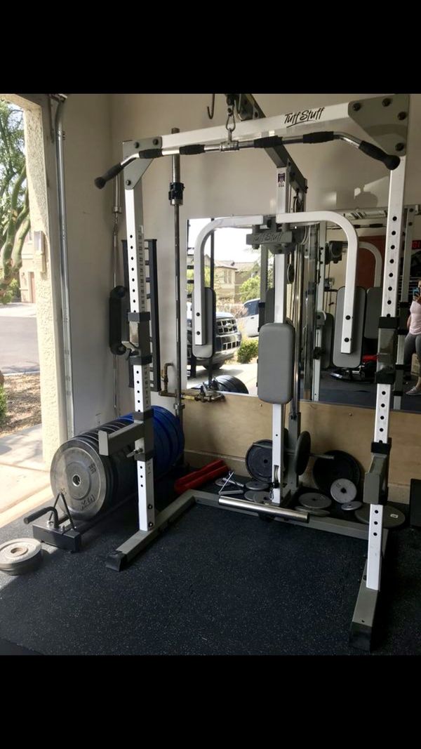 Tuff stuff squat rack weight bench with 300lbs and accessories for Sale in Saint Charles, MO