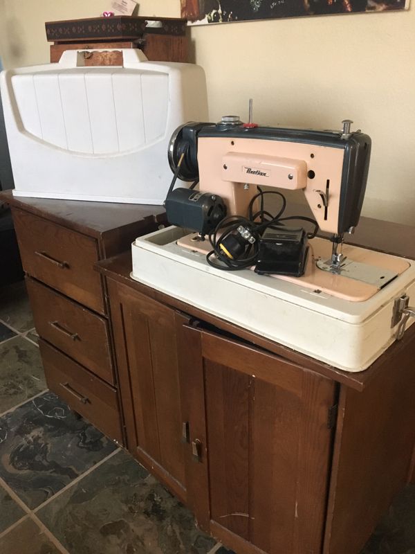 Vintage Brother sewing machine. And sewing table.. table has a fold out