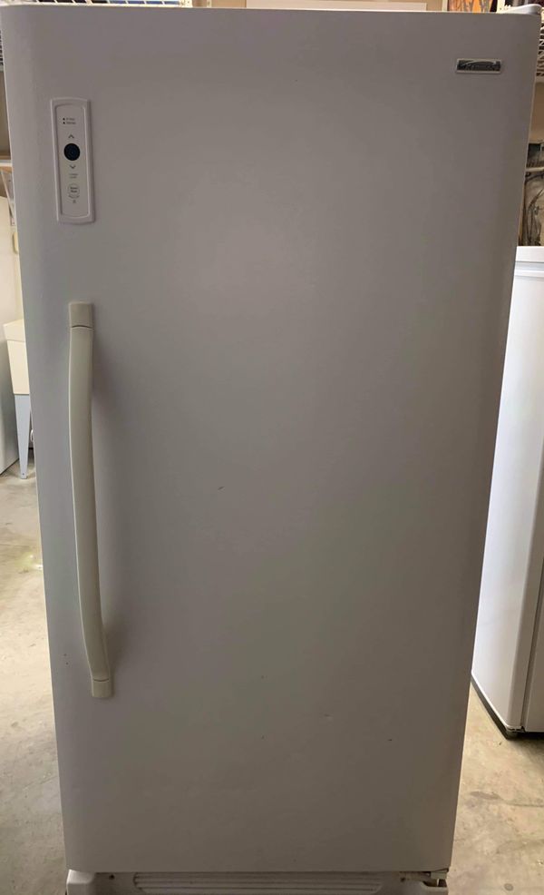 kenmore refrigerator frost in freezer