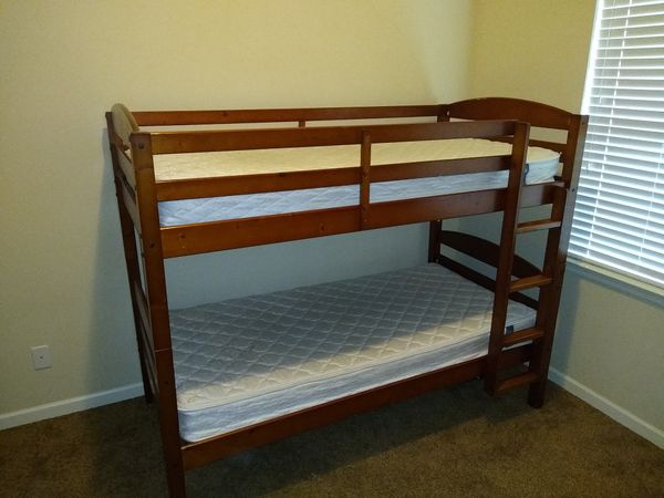 used wooden bunk beds with mattresses