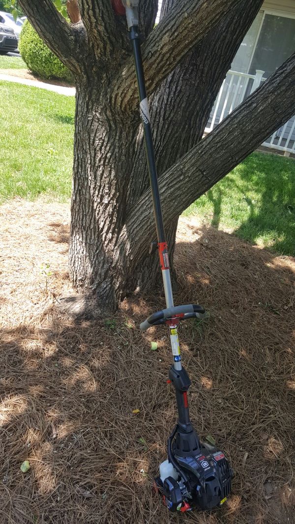 Brand new Craftsman 27cc straight shaft weed wacker gas trimmer.