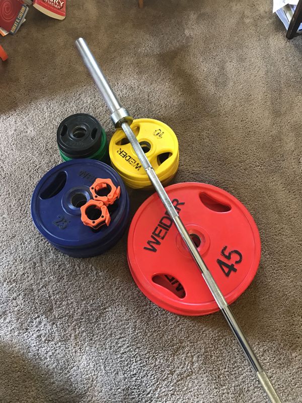 Weider rubber coated weights with Olympic bar and weight clips 255 lbs