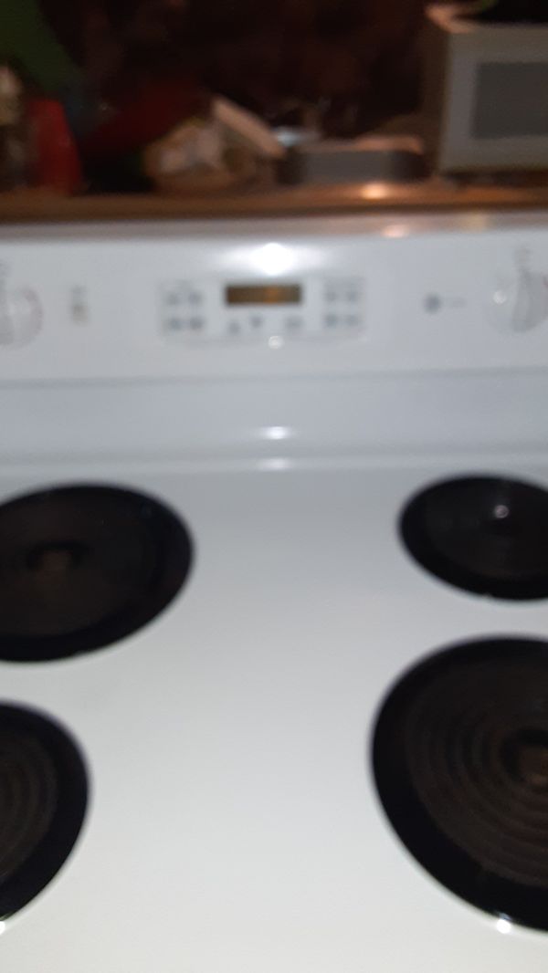 GE Profile true temp electric stove for top burners and brand new oven