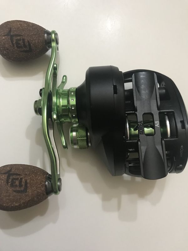 13 Fishing Concept A baitcaster fishing reel with trick