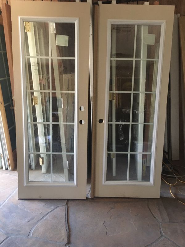 NEW FRENCH DOORS 60x80 SET UP NEVER INSTALLED for Sale in Phoenix, AZ