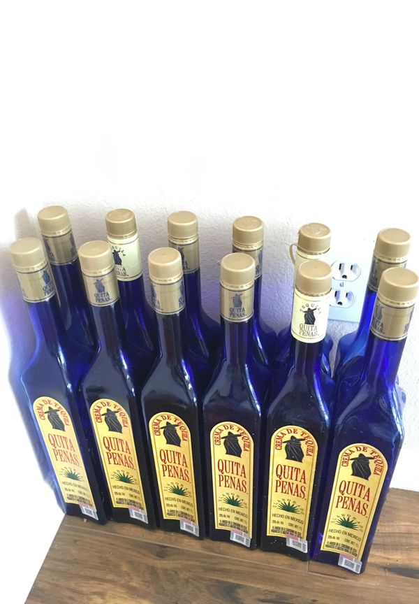 Quita Penas 12 EMPTY BOTTLES OF Blue Glass color for Sale in Apple ...
