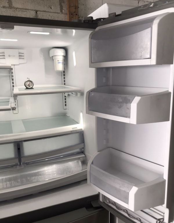 Ge stainless steel refrigerator 36” wide working perfect and 4 months