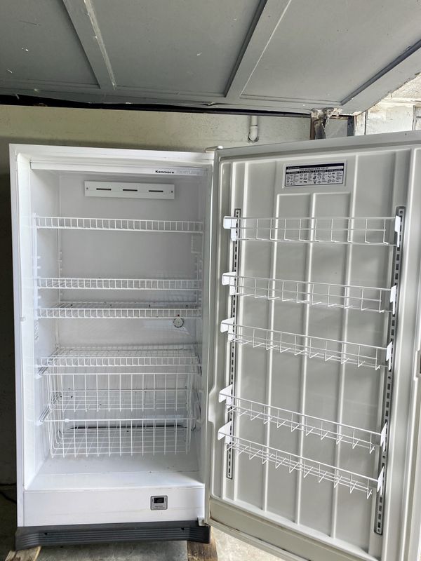 kenmore refrigerator frost in freezer