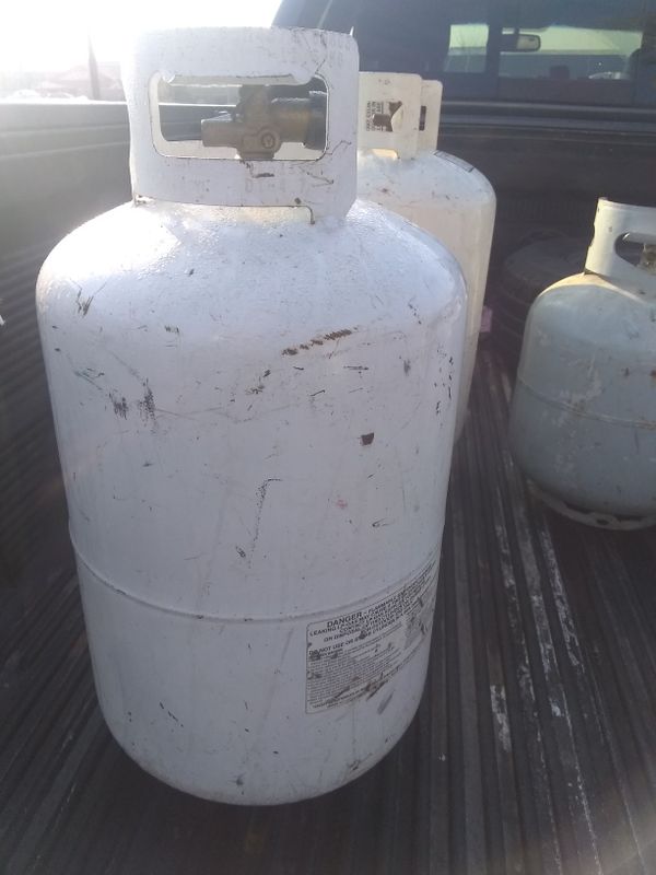 Large propane tanks used for camper or travel trailer empty asking $15 ...