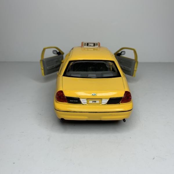 yellow taxi toy