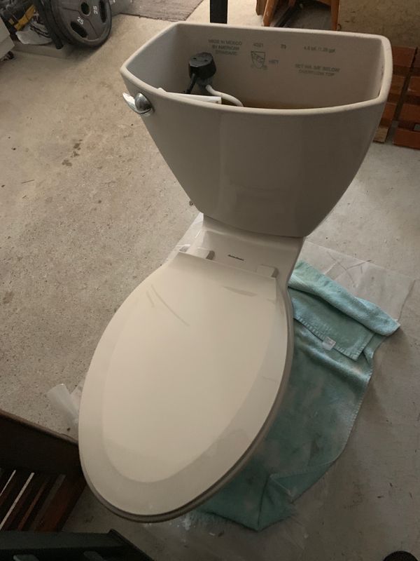 American Standard toilet —cream/almond color for Sale in Virginia Beach ...