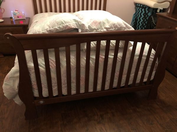 pali crib mattress on floor