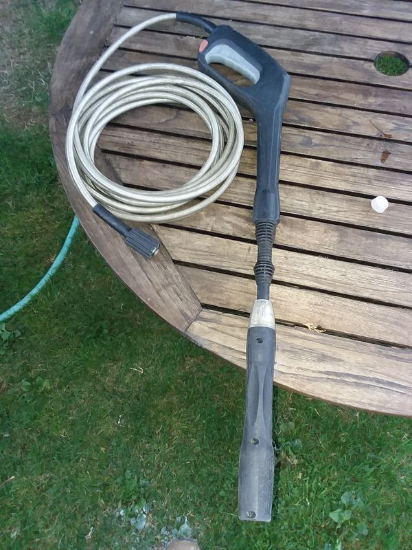 pressure washer wands, greenworks,with attached hoses, and 2 seperate