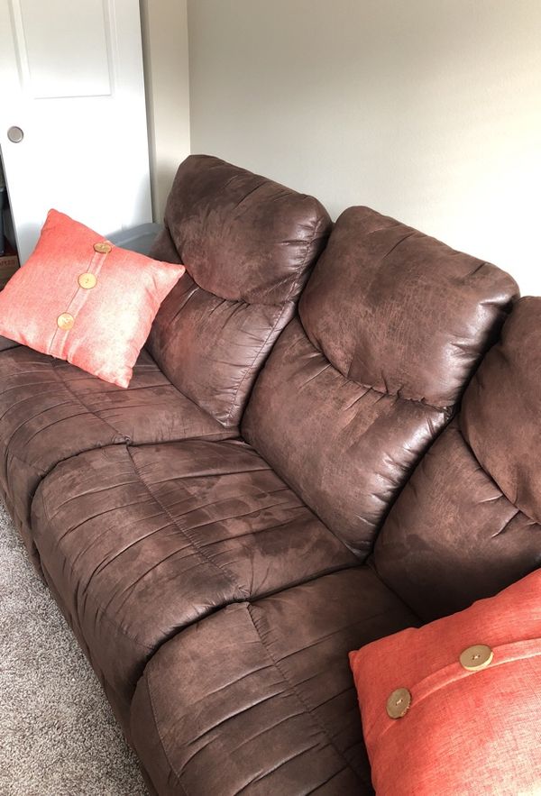 Brown Lazy Boy Sofa. Recycled Leather, leather was treated upon