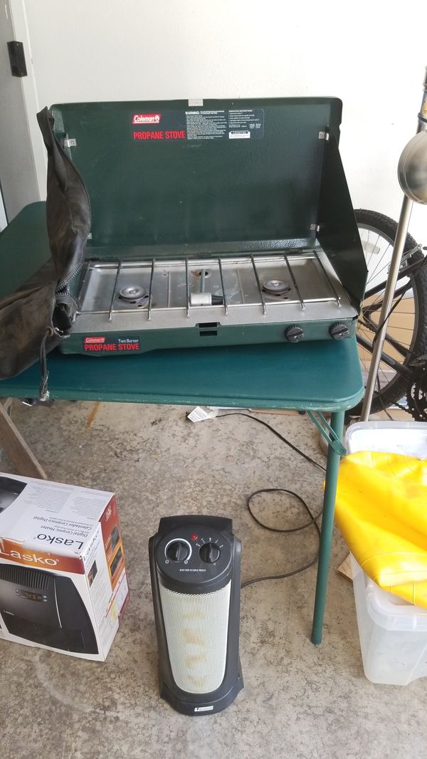 Coleman camp stove with carrying case, and lamp case. Surround sound