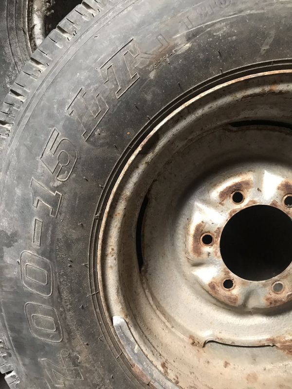 One used 70015 LT trailer tire with 6 lugs rim hold air 40 each no bargain price firm for Sale