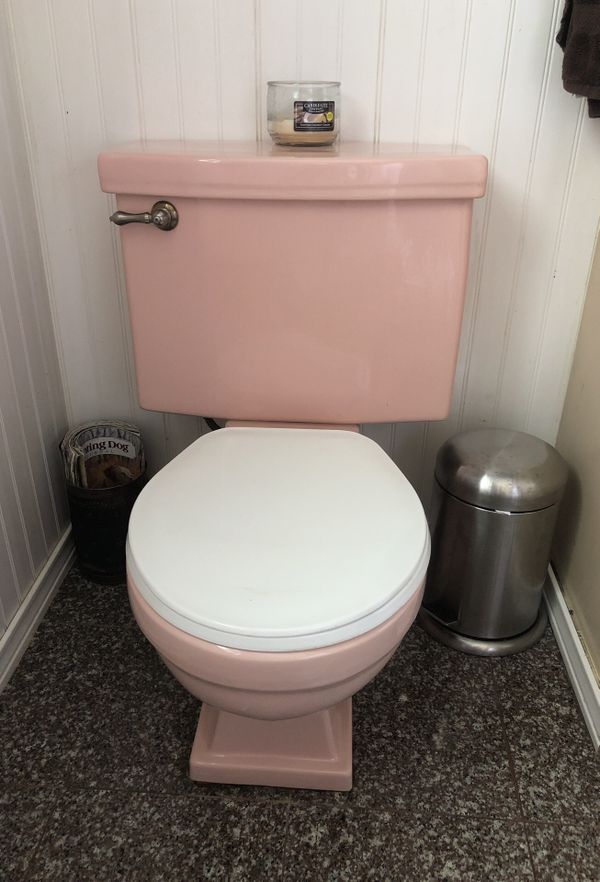 1950s Vintage pink bathroom fixtures. Bath tub toilet and sink. Bathtub is 4ft by 3 ft 9 inches ...