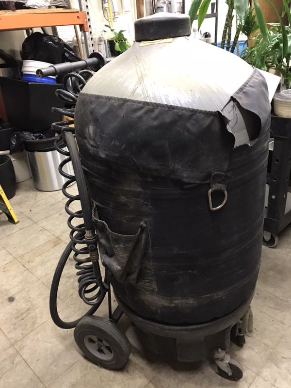 Portable water tank on wheels to water plants used for nurseries or