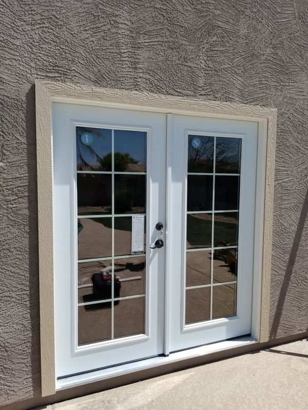 Masonite patio double French door with the grids inside of the glass