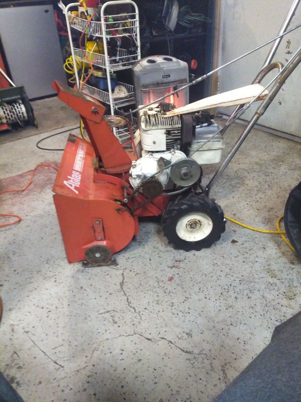 Atlas stage 2 snowblower for sale and a Sunbeam vintage snow thrower