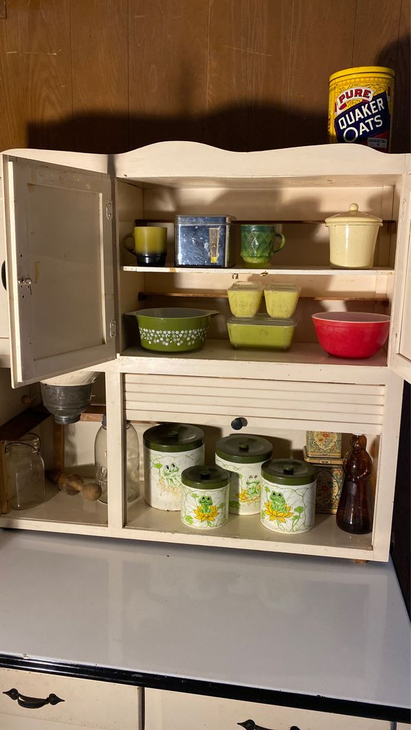 Antique Hoosier with metal enameled pull out table roll door