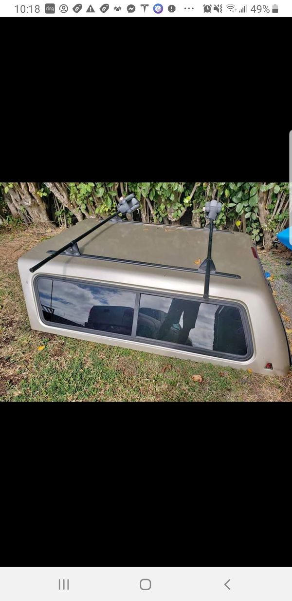Leer Camper Shell for Toyota Tundra with surf racks and kayak holder for Sale in Kaneohe, HI