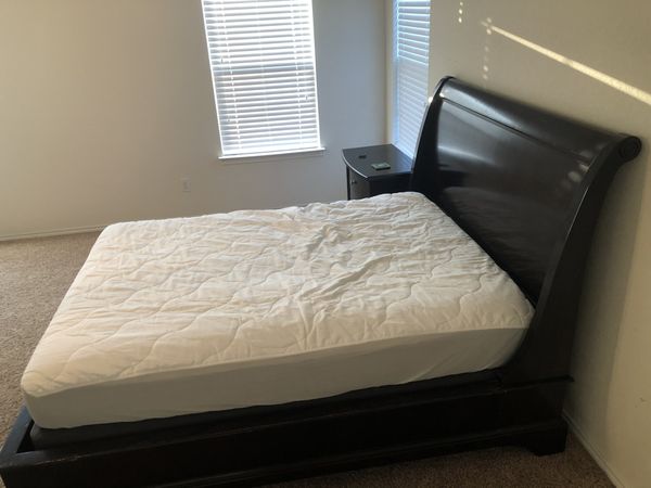 Queen size bed frame from Rooms To Go (mattress and box spring sold