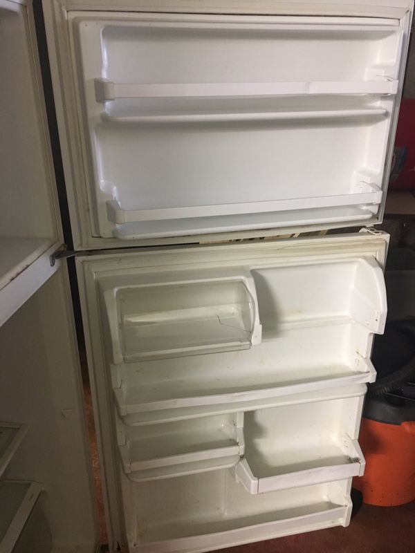 Free non working Whirlpool Roper - 20.9 Cu. Ft. Top-Mount Refrigerator