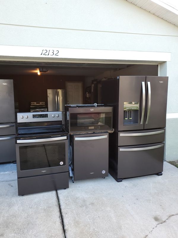 New black stainless whirlpool appliance package. for Sale in Tampa, FL