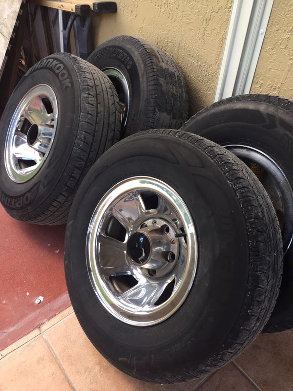 Rims 15x5 with 235/75/15 tires(3) and 265/70/15 (1) tire